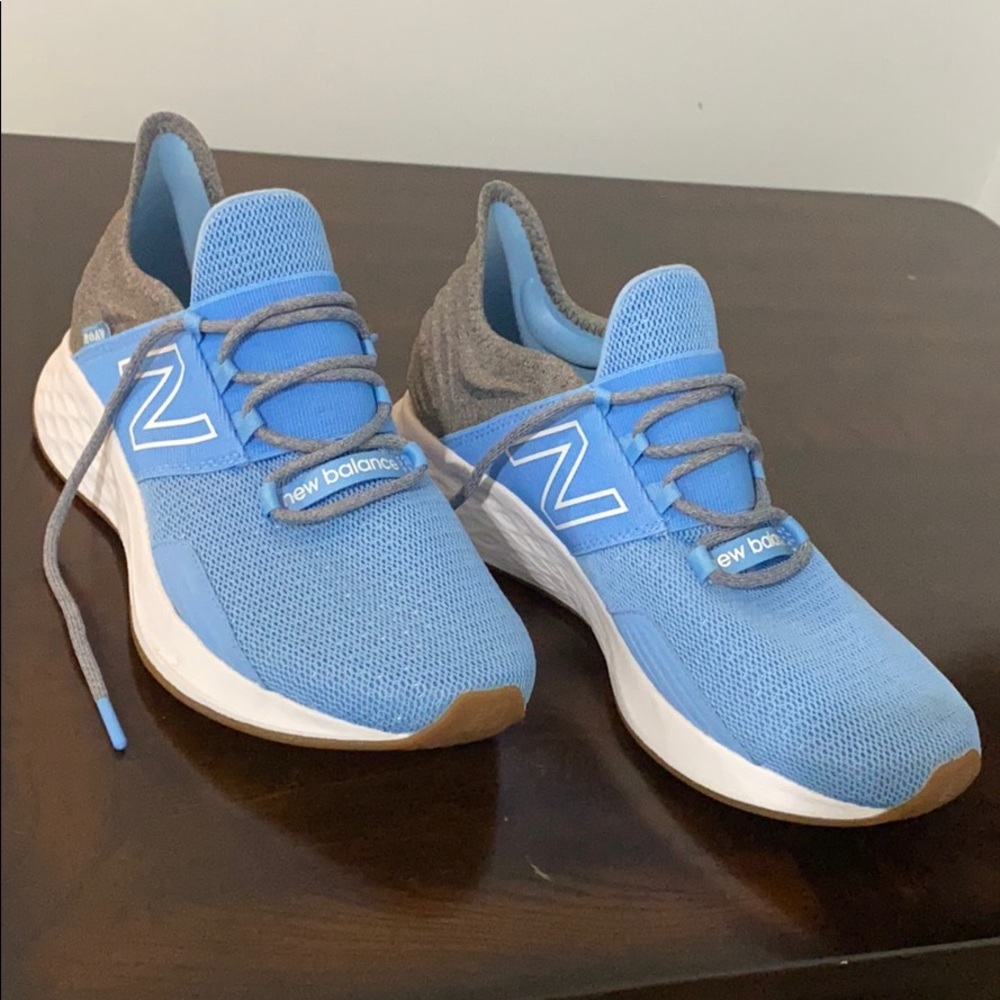 Woman’s blue New Balance Running shoe